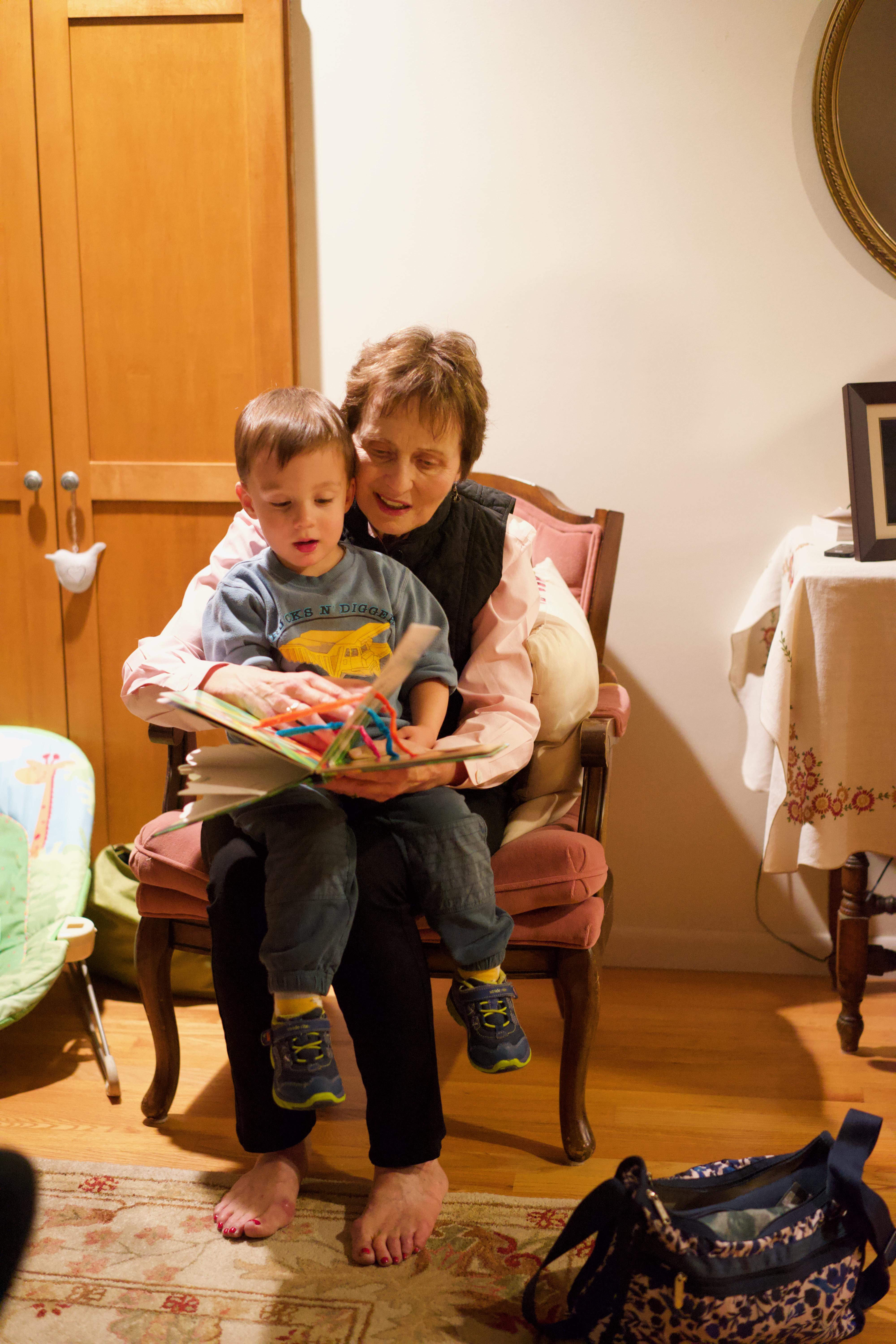 Rita reading to Levi.  Rita l…