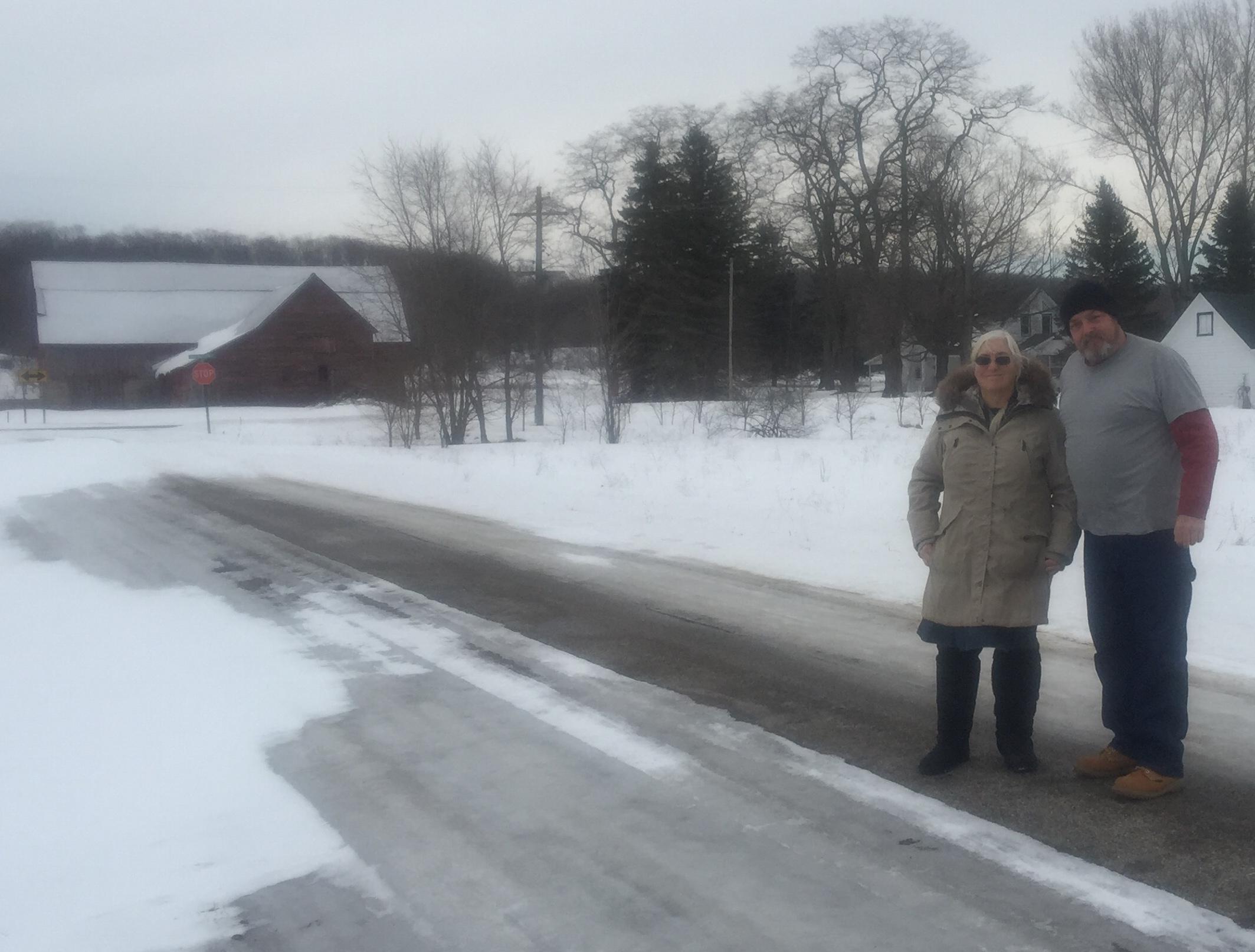 Brenda with Larry in front of…