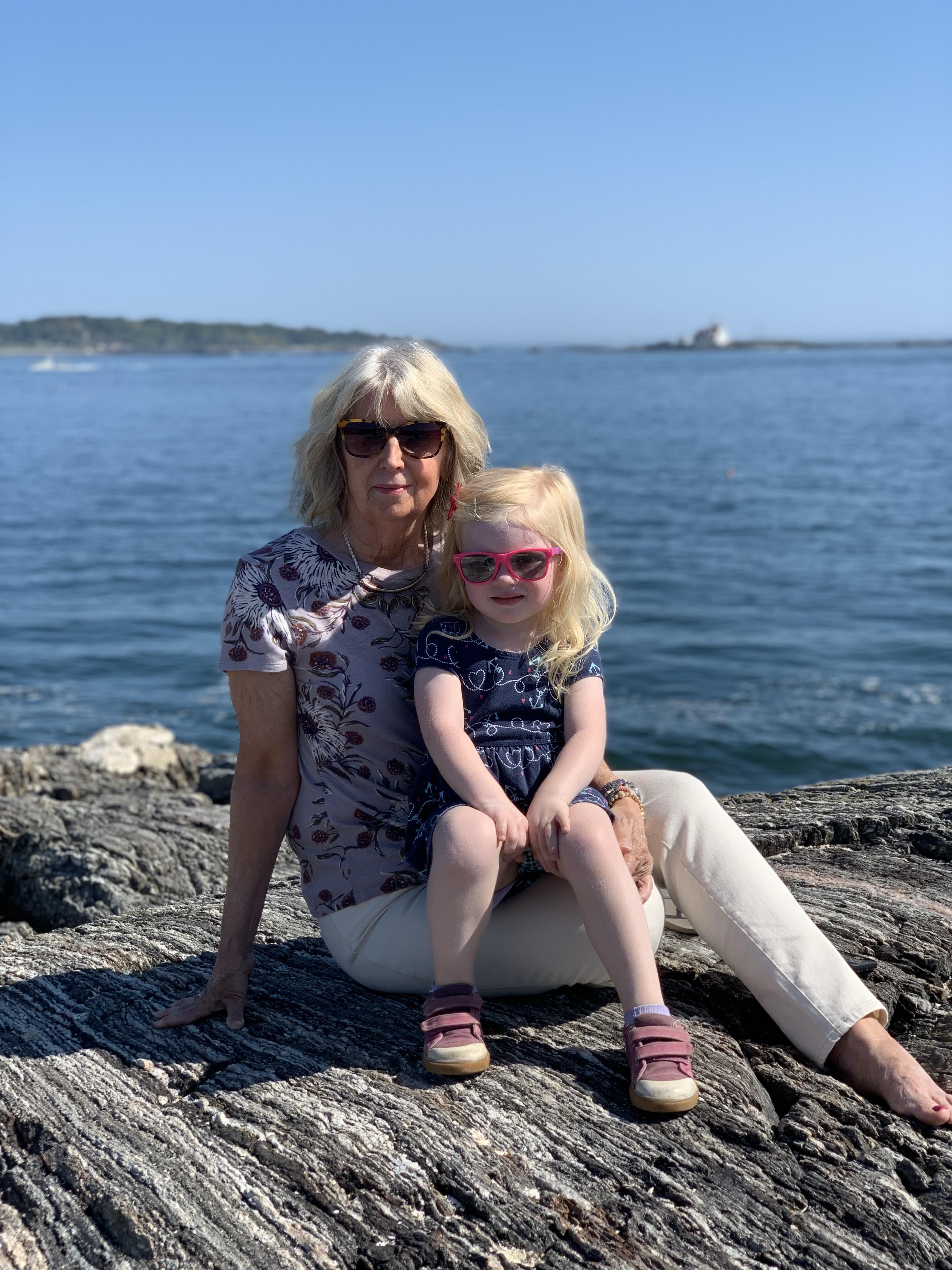 Mom and Scarlett by the ocean.