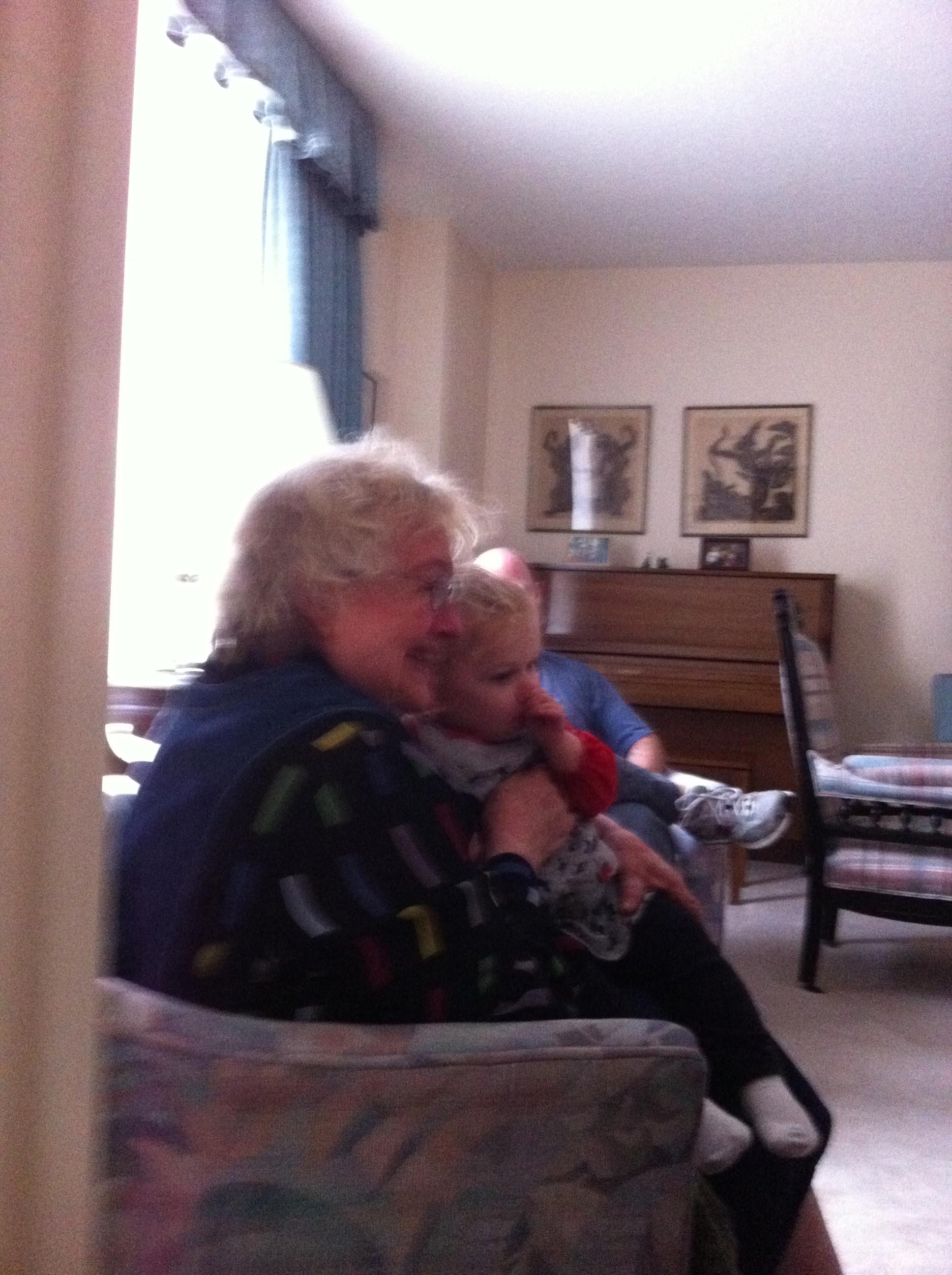 Snuggling her great-granddaug…