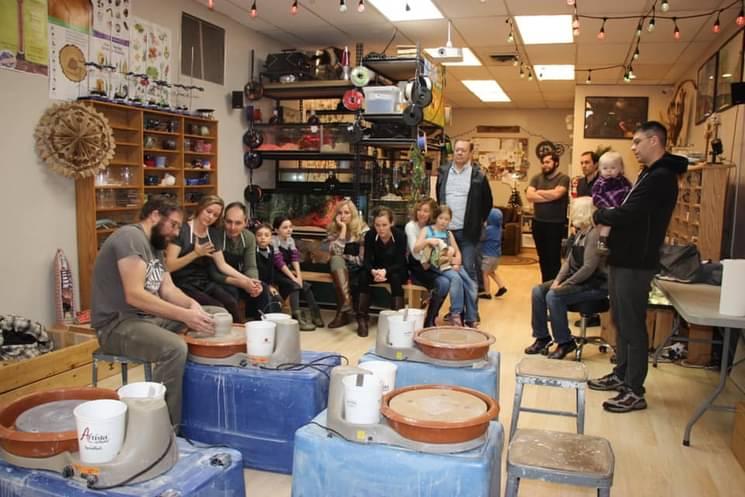 Wasson family learning pottery