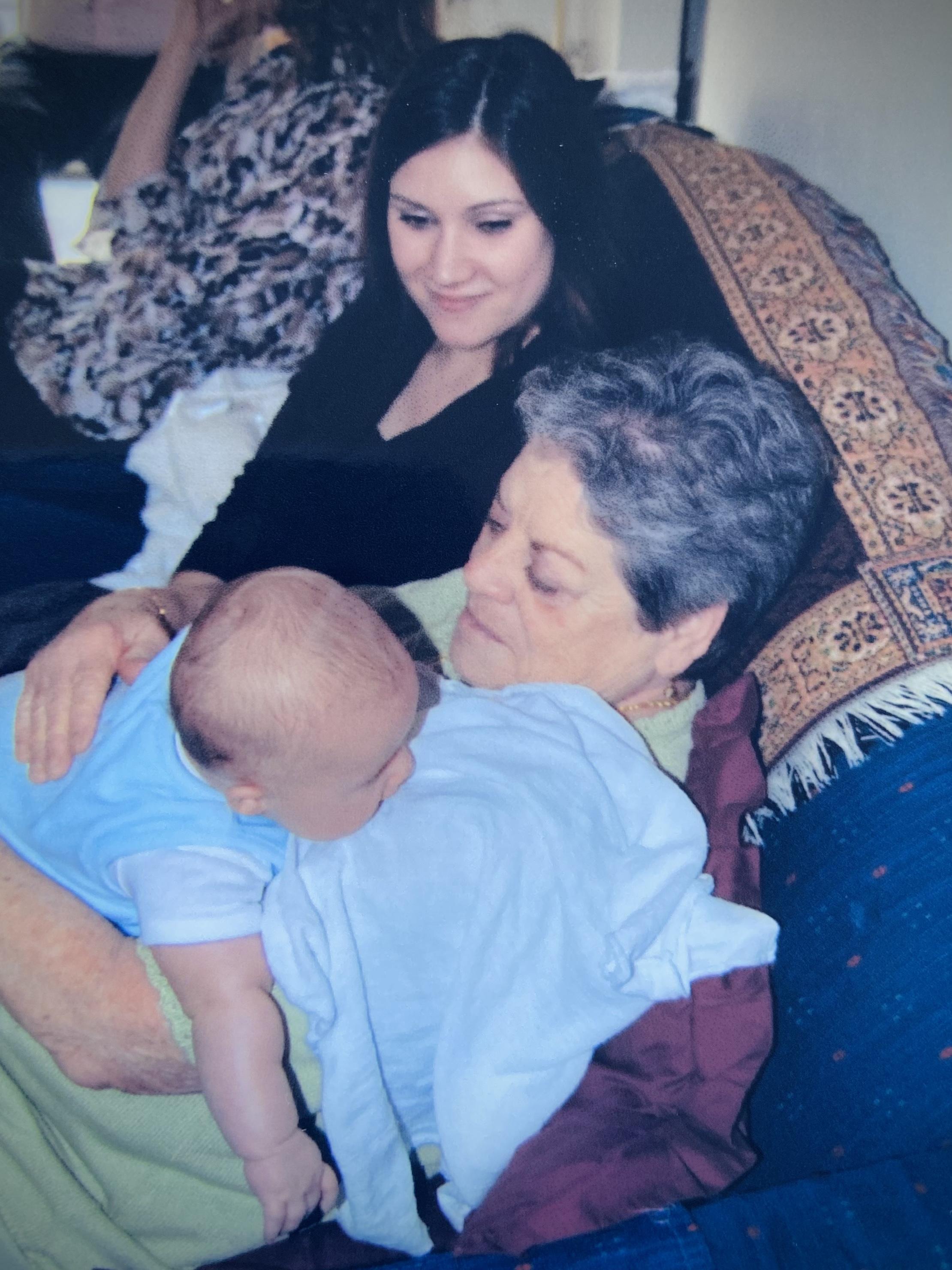 Aunt Dolores holding Miles ri…