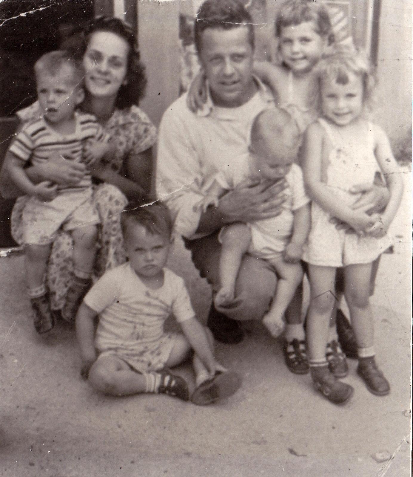 Rick in Dad’s lap, the baby o…