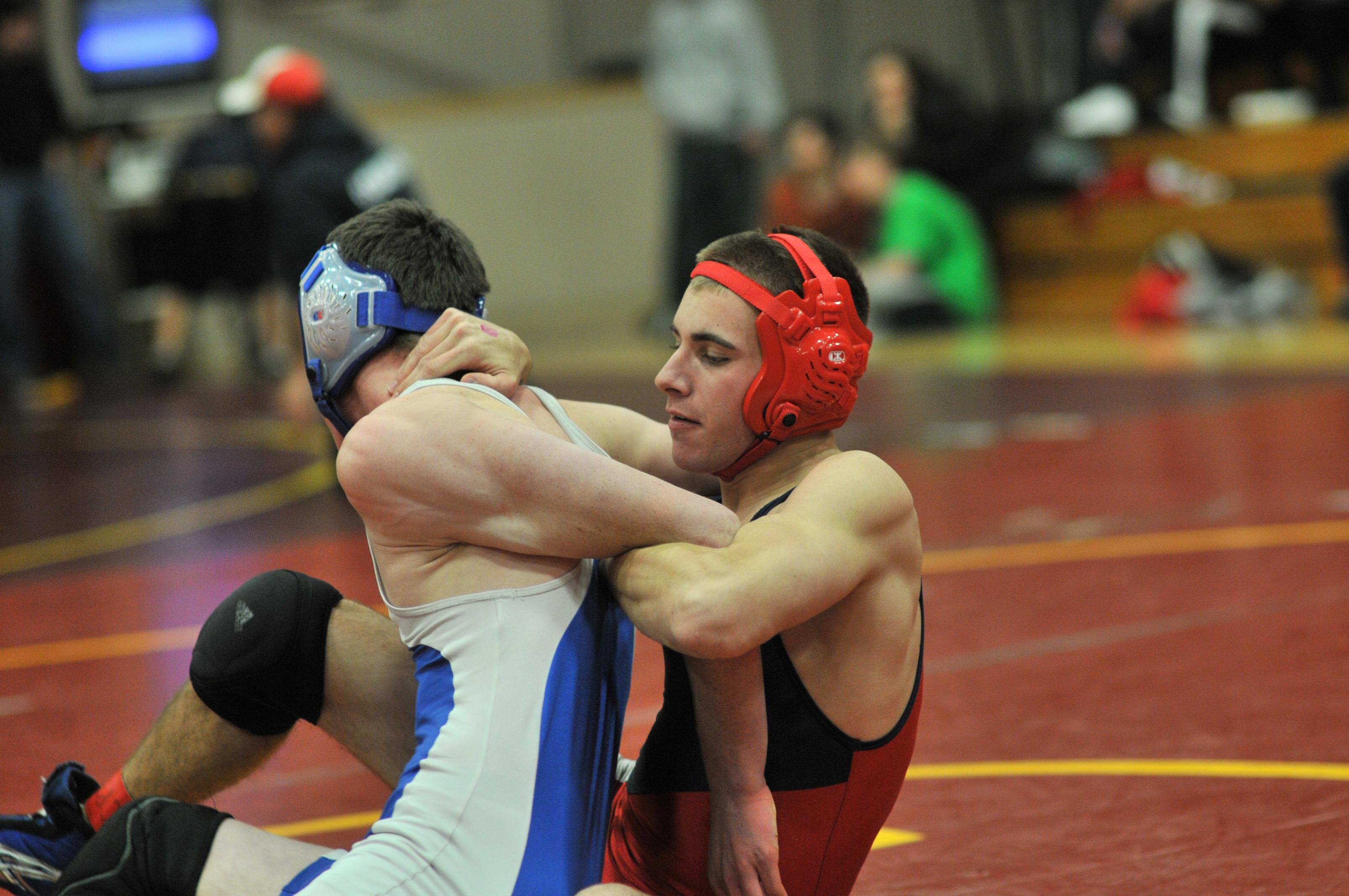 Austin works on a bar arm, ha…