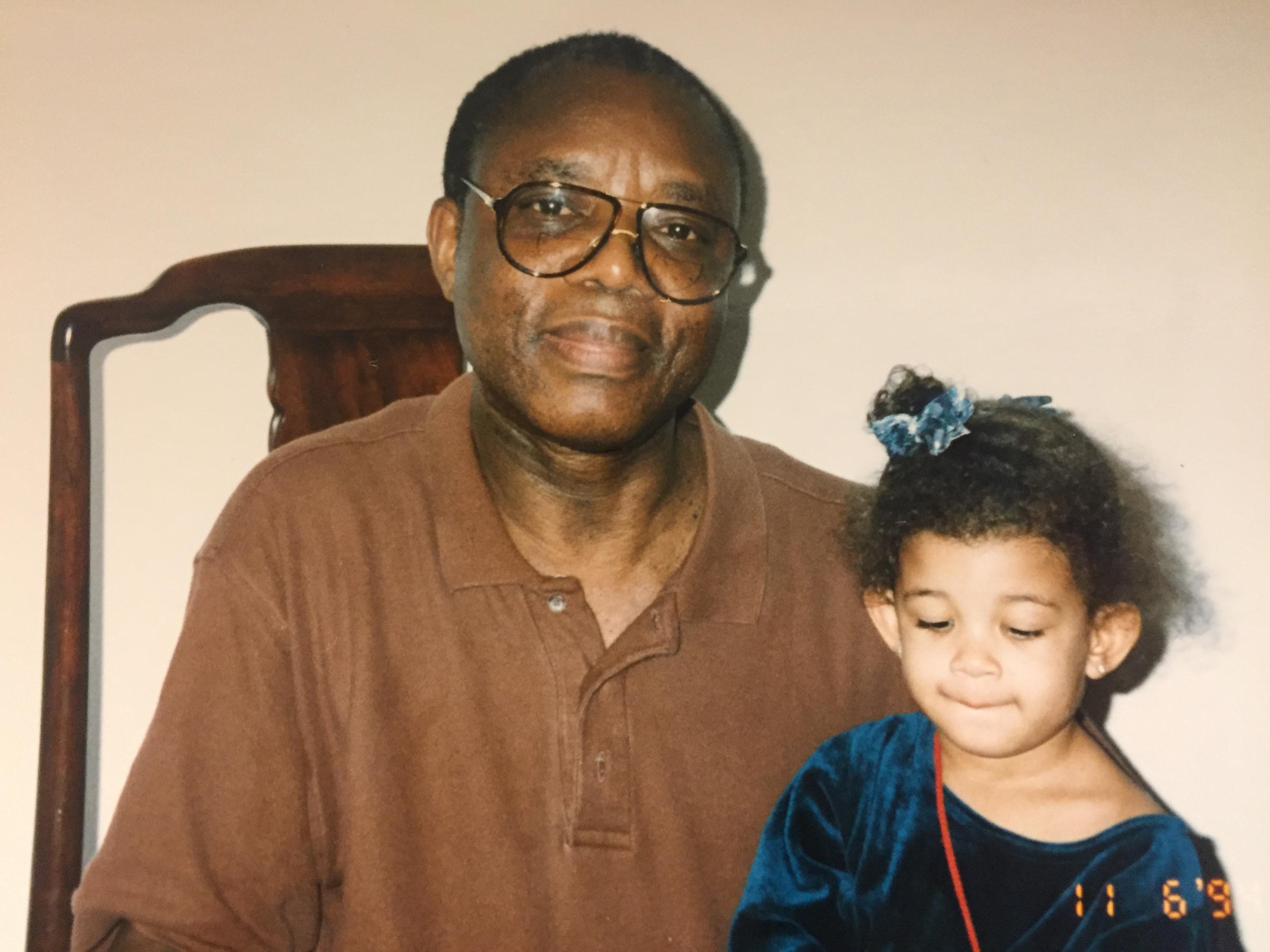 With granddaughter, Naaji