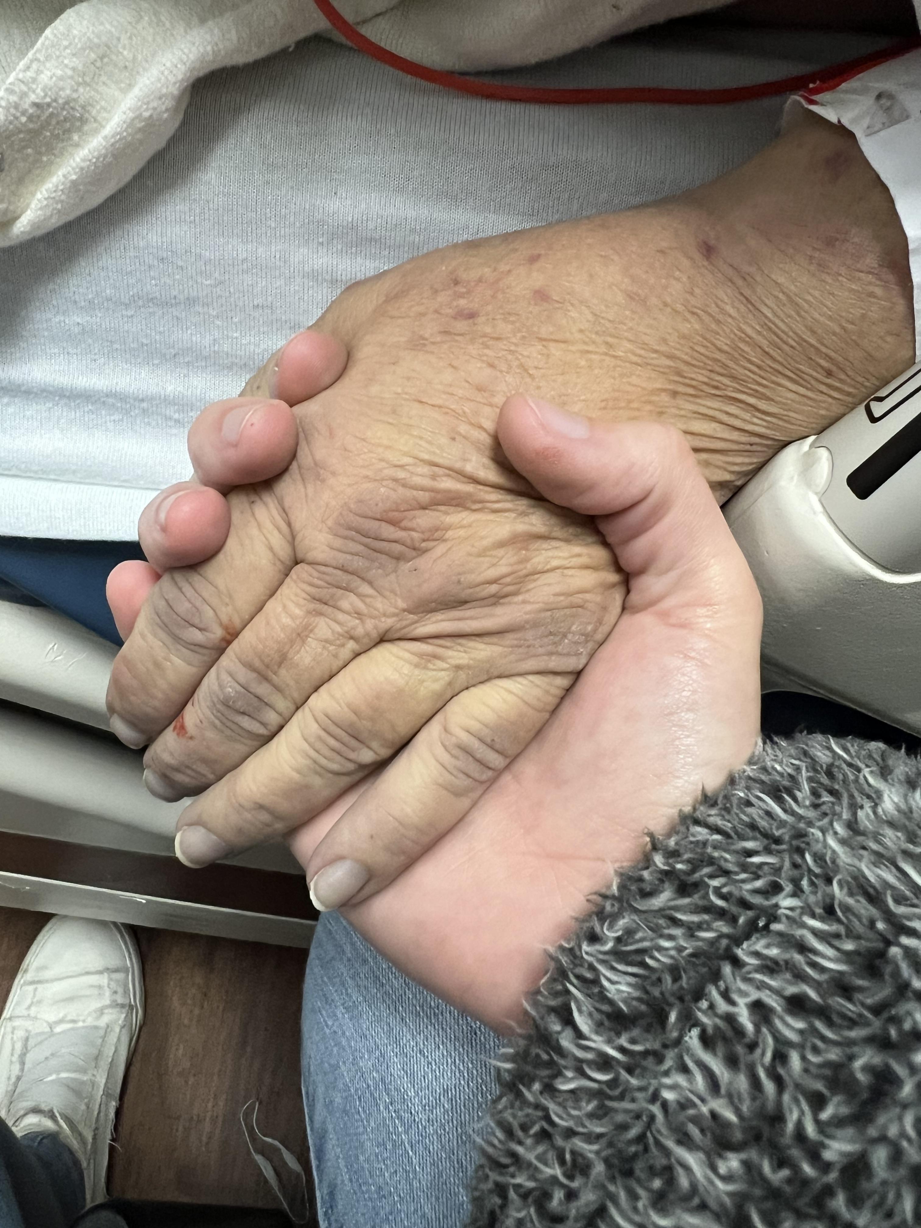 I held her hand as she went h…