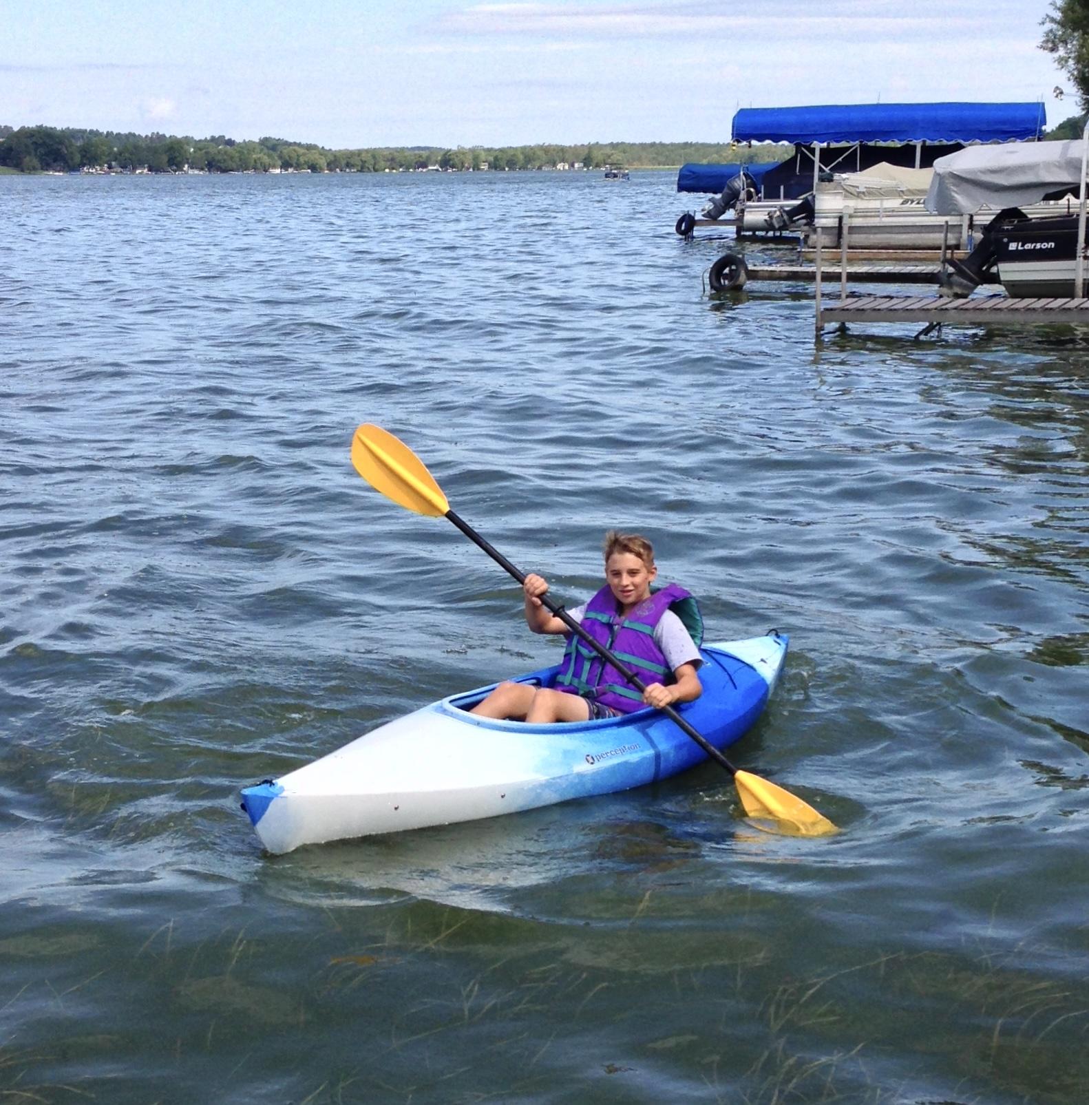 Kayaking in front of Aunt Jen…