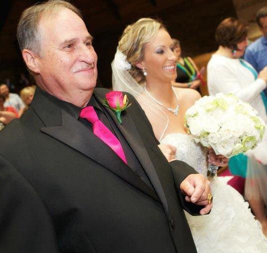 Dennis walking his daughter d…