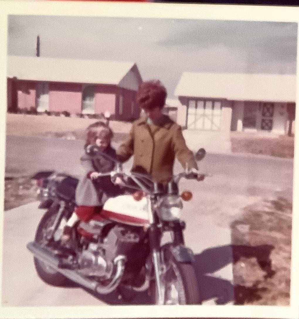 Sitting on Dad’s motorcycle