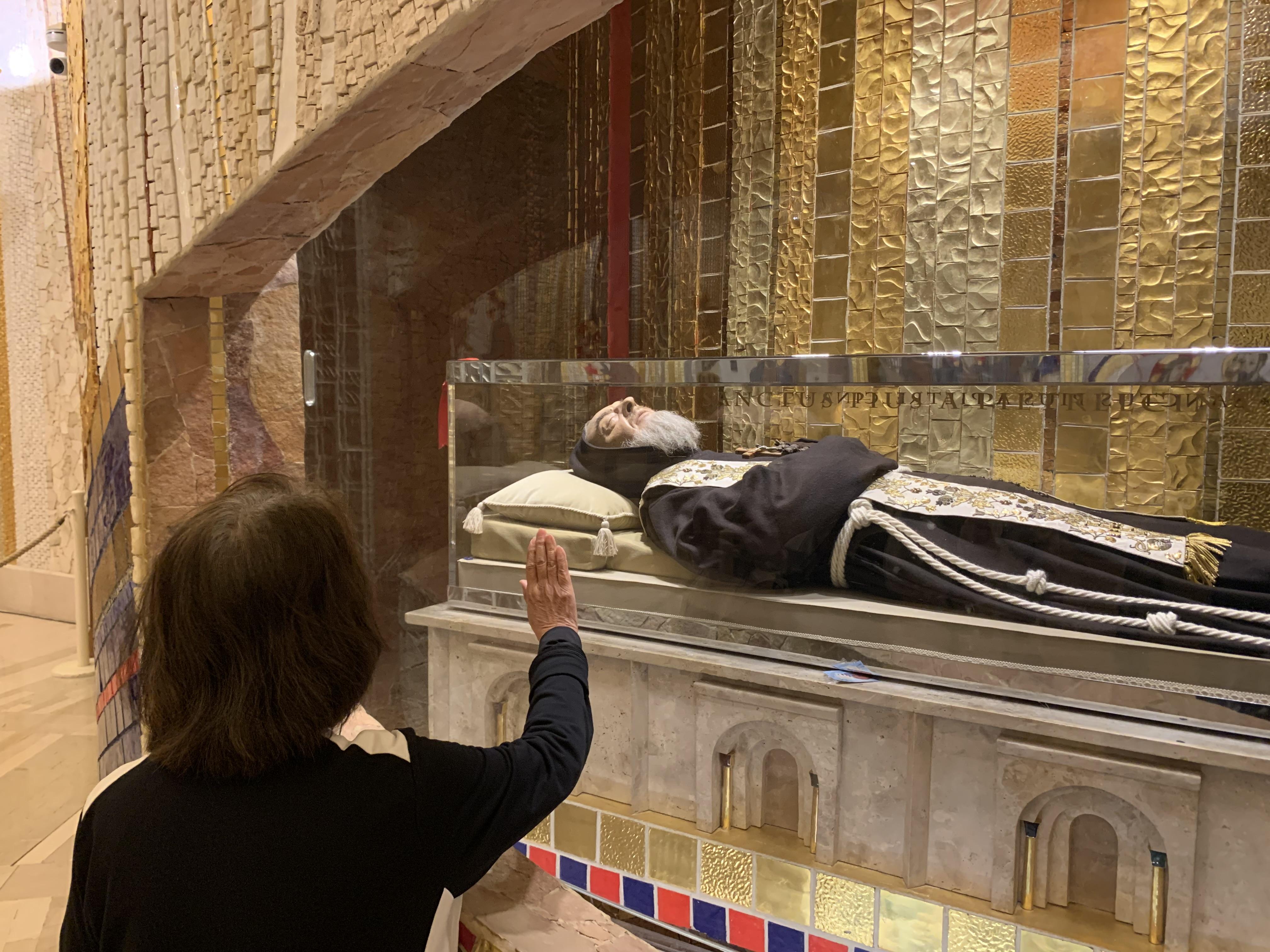 Moms praying to Padre Pio