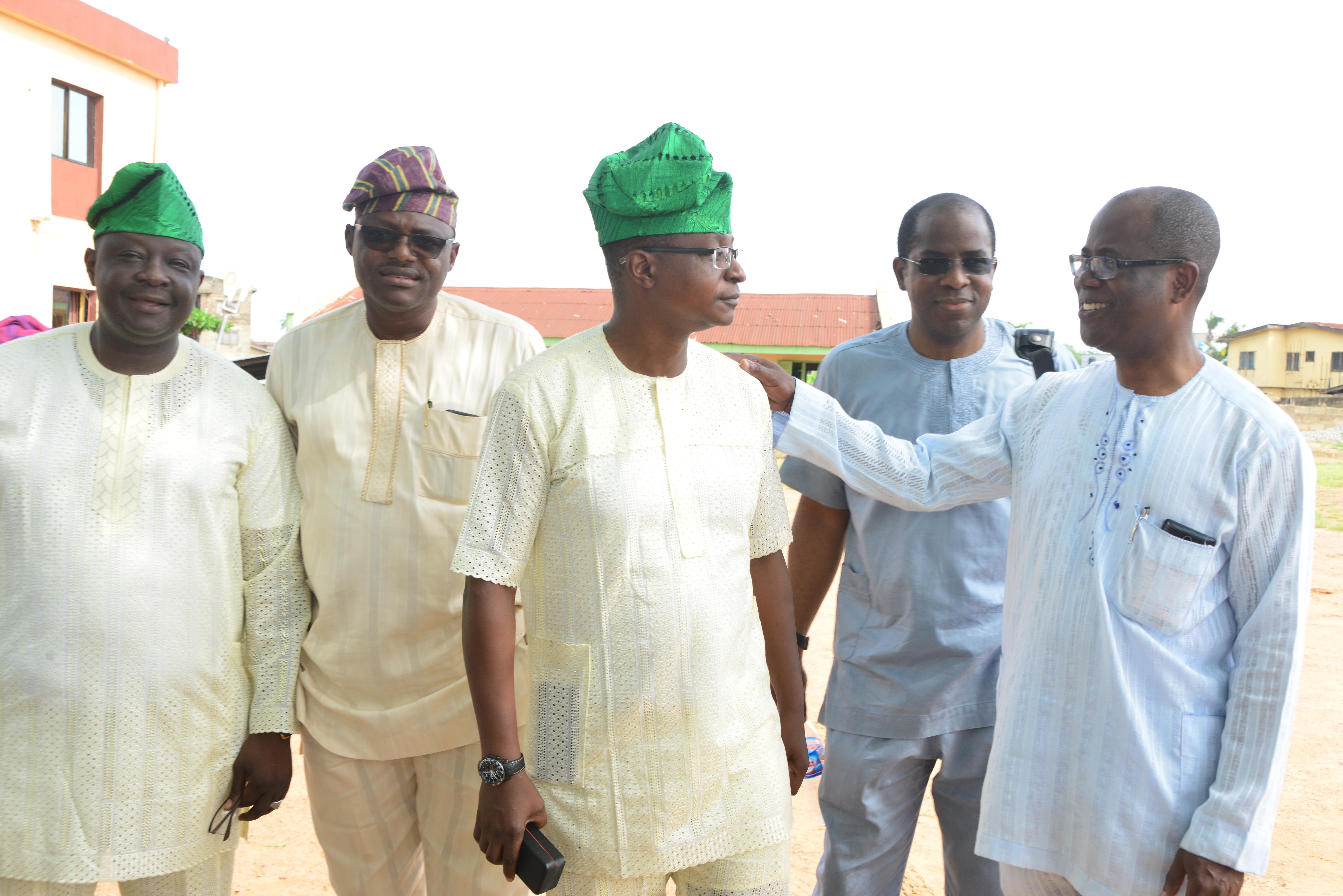 With brother Bunmi and friends