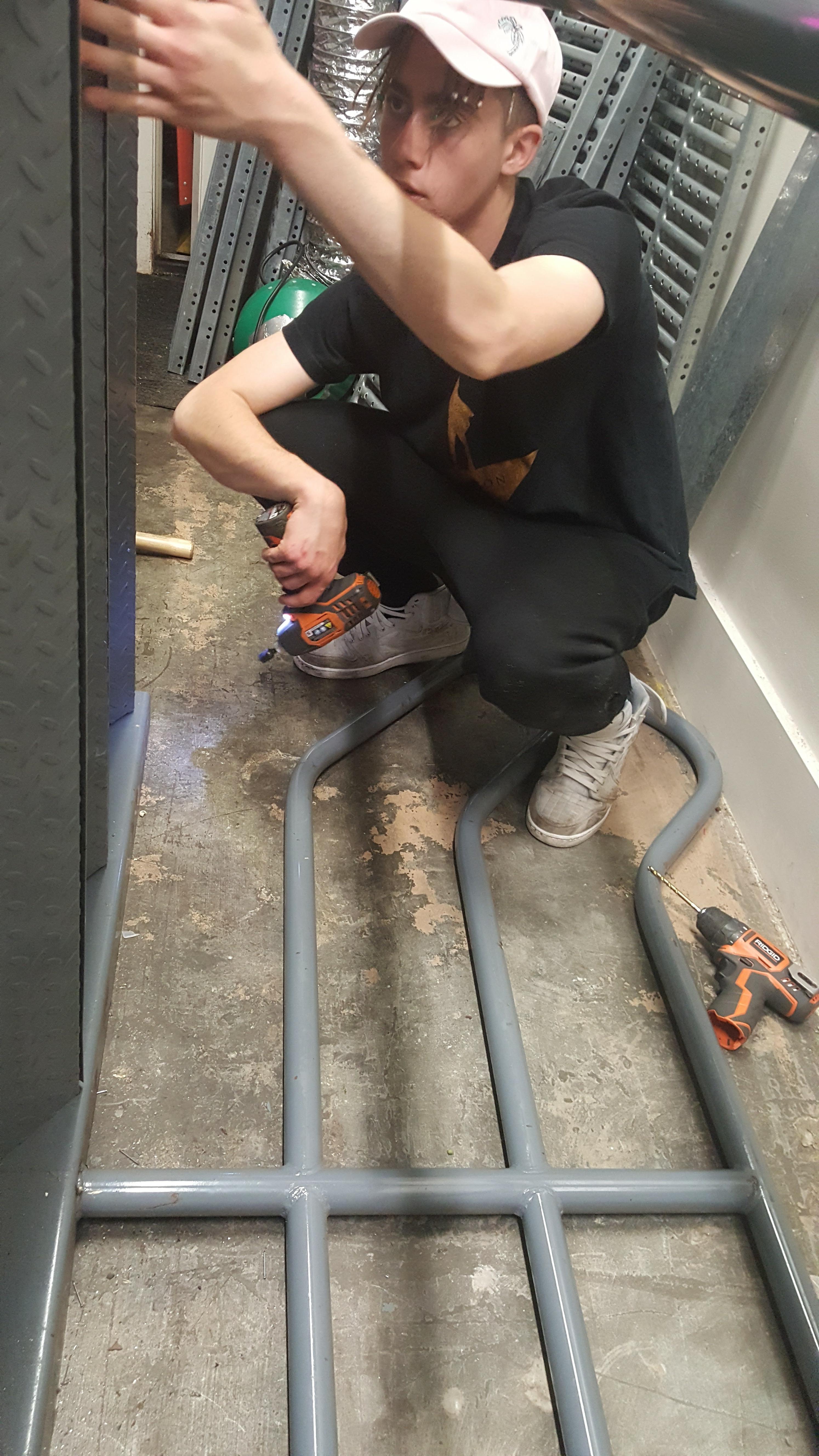 Constructing metal staircase …